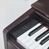 YAMAHA YDP103B Digital piano featuring GHS keyboard and traditional AWM synthesis to deliver real piano sounds.